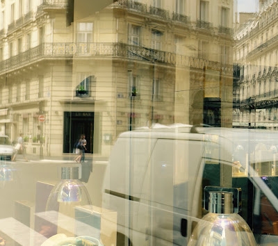 Window reflection near Place d'Opera.