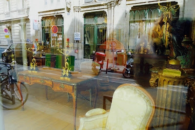 Window reflection, antique store on rue Mazarine.  